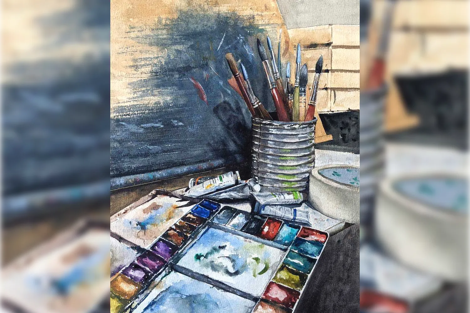 Artist workstation with watercolor forest painting and brushes at Avenue Road Arts School.