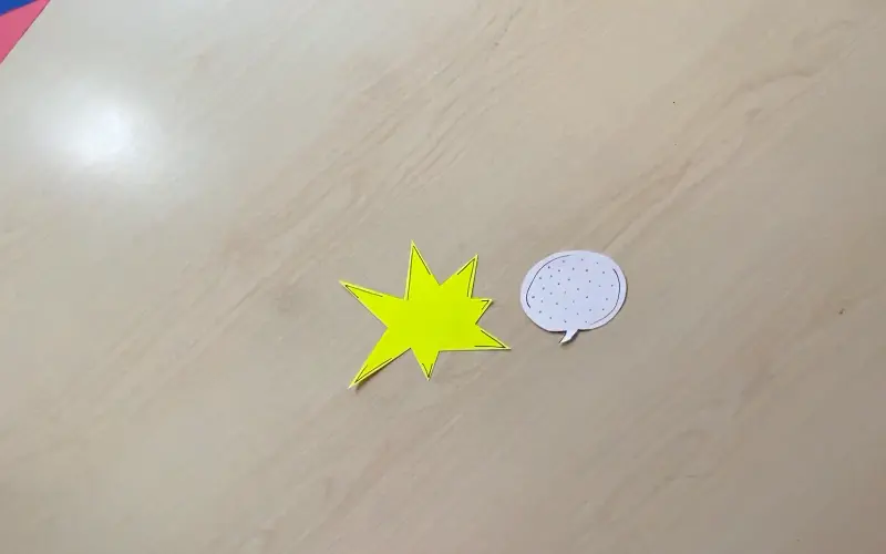 Egg-shaped speech bubble drawn on white paper with a personalised message written inside